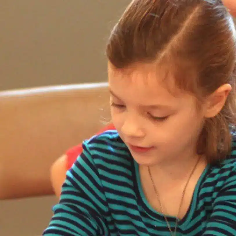 Girl playing at church